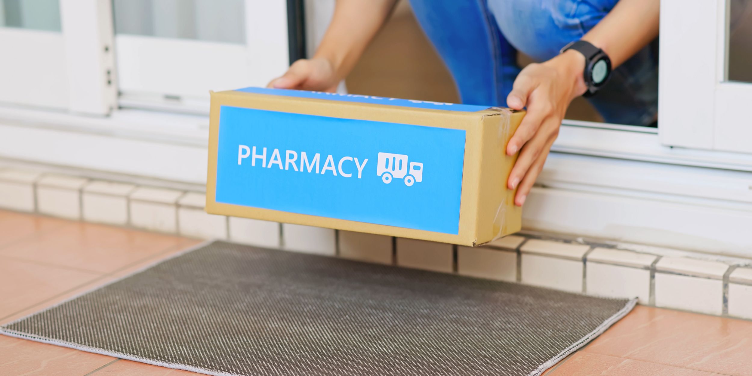 Safeguard your B2B Pharmaceutical Accounts. Explore DCI's role in International Pharmaceutical Distribution Debt Recovery: close up of asian female patient wear mask recieve medication package box from pharmacy hospital delivery service at home - she pick it up on doormat